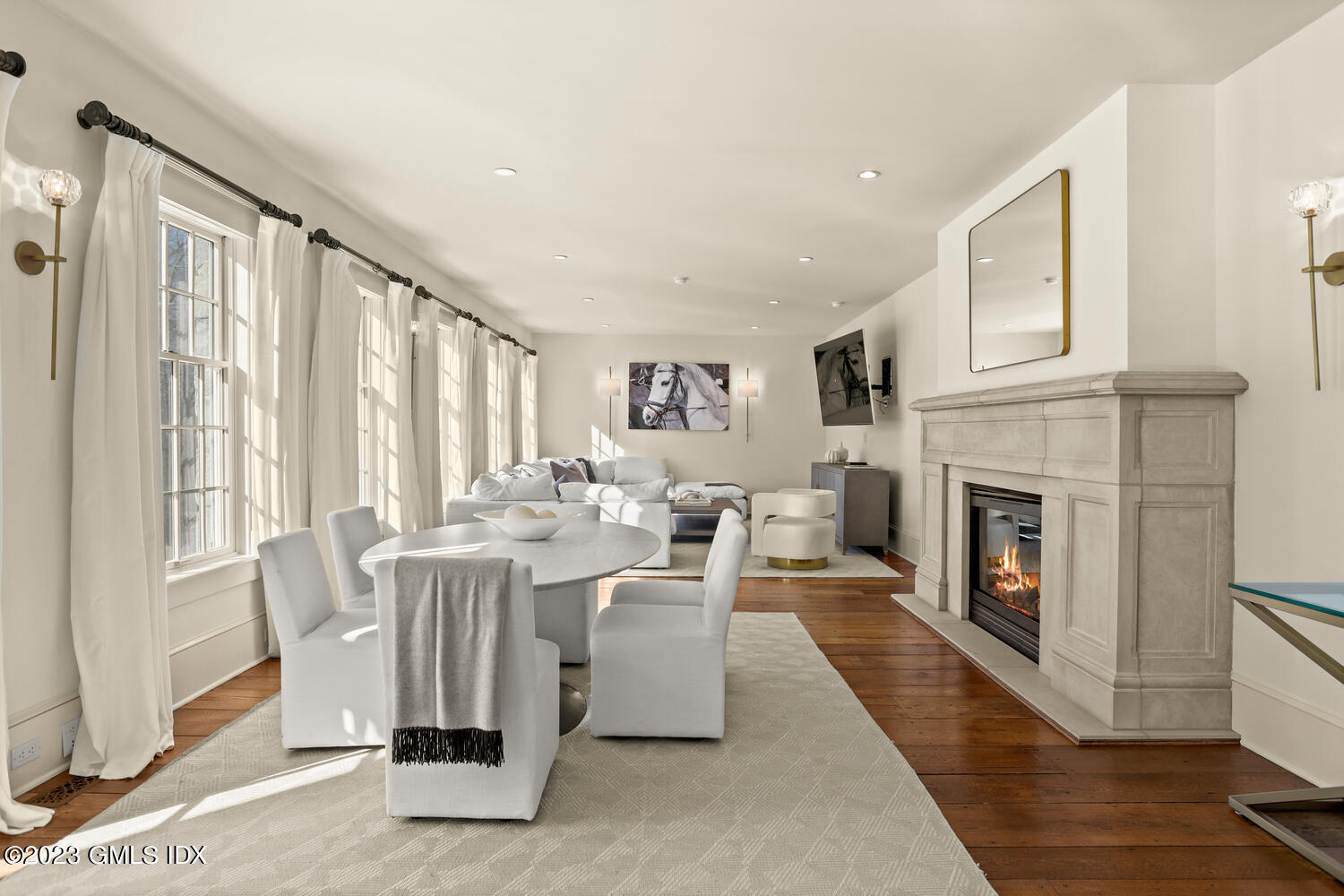 28 Dairy Road Greenwich, CT 06830 - Photo 16 of 44 a living room with furniture a fireplace and a window