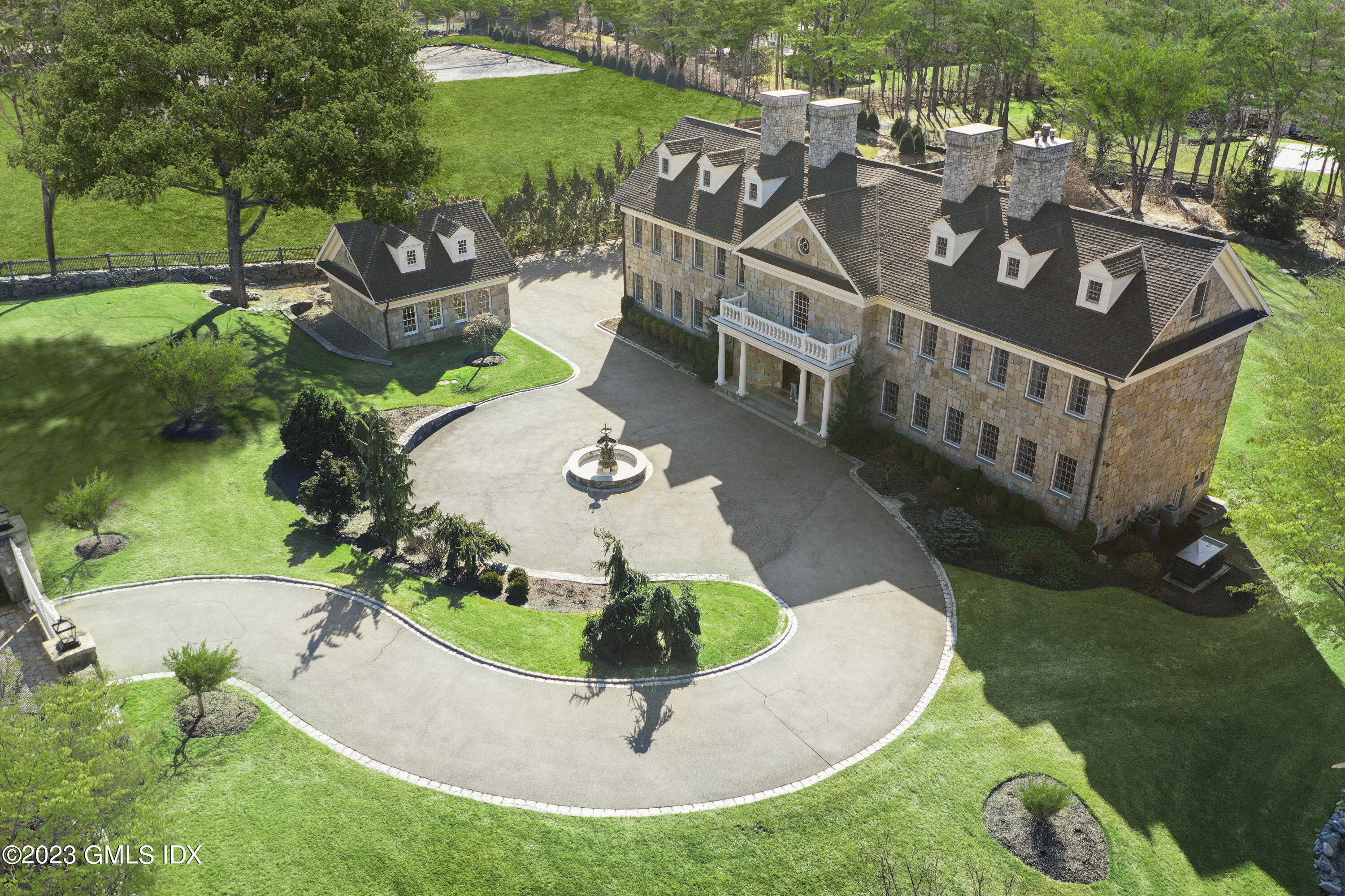 28 Dairy Road Greenwich, CT 06830 - Photo 2 of 44 an aerial view of a house having yard