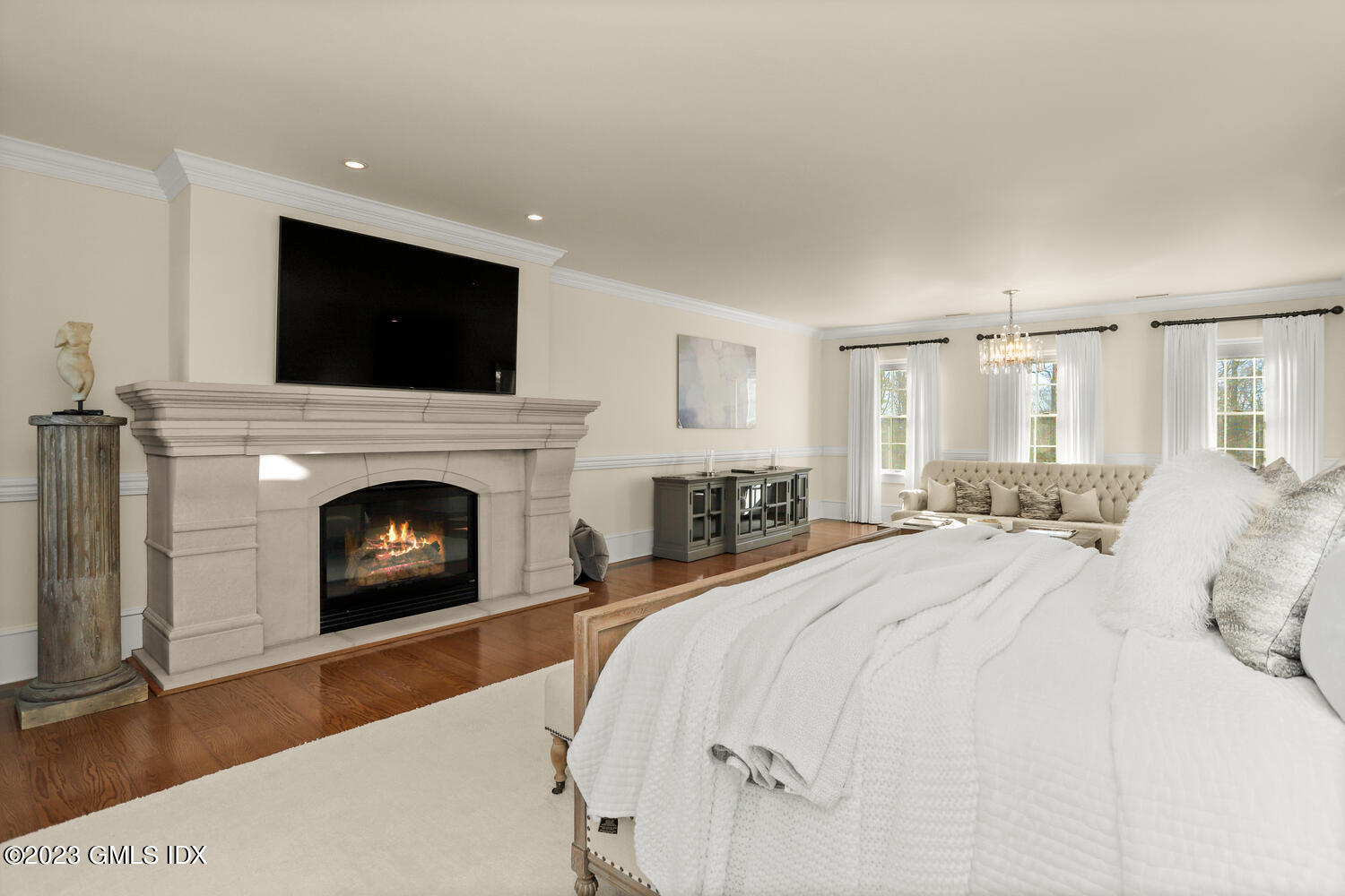 28 Dairy Road Greenwich, CT 06830 - Photo 23 of 44 a bedroom with a bed and a fireplace