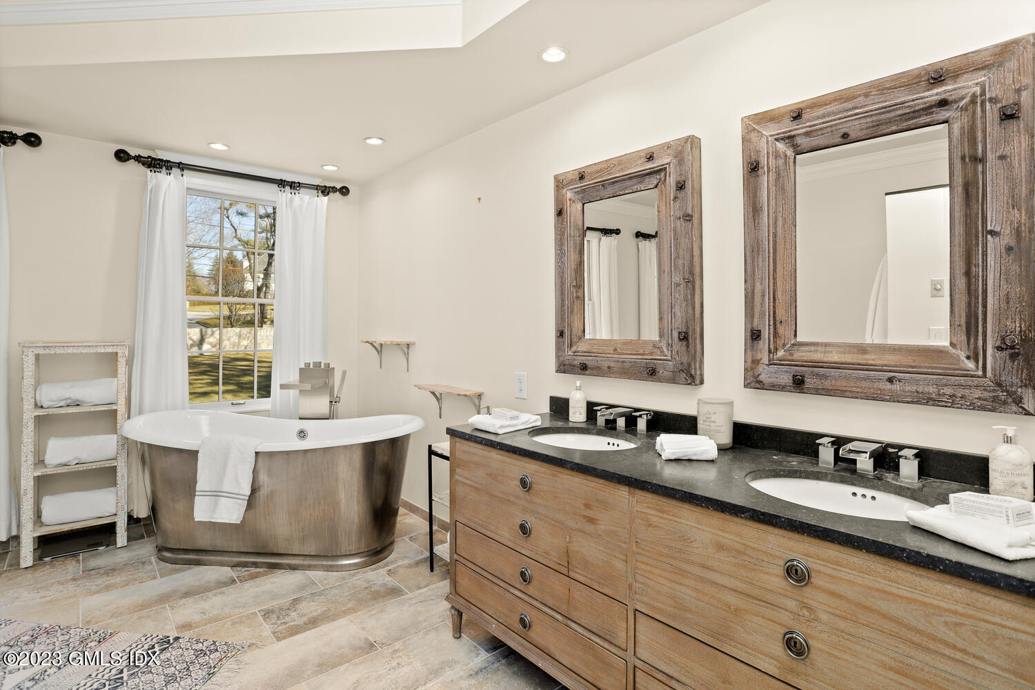 28 Dairy Road Greenwich, CT 06830 - Photo 26 of 44 a bathroom with a double vanity sink mirror and bathtub