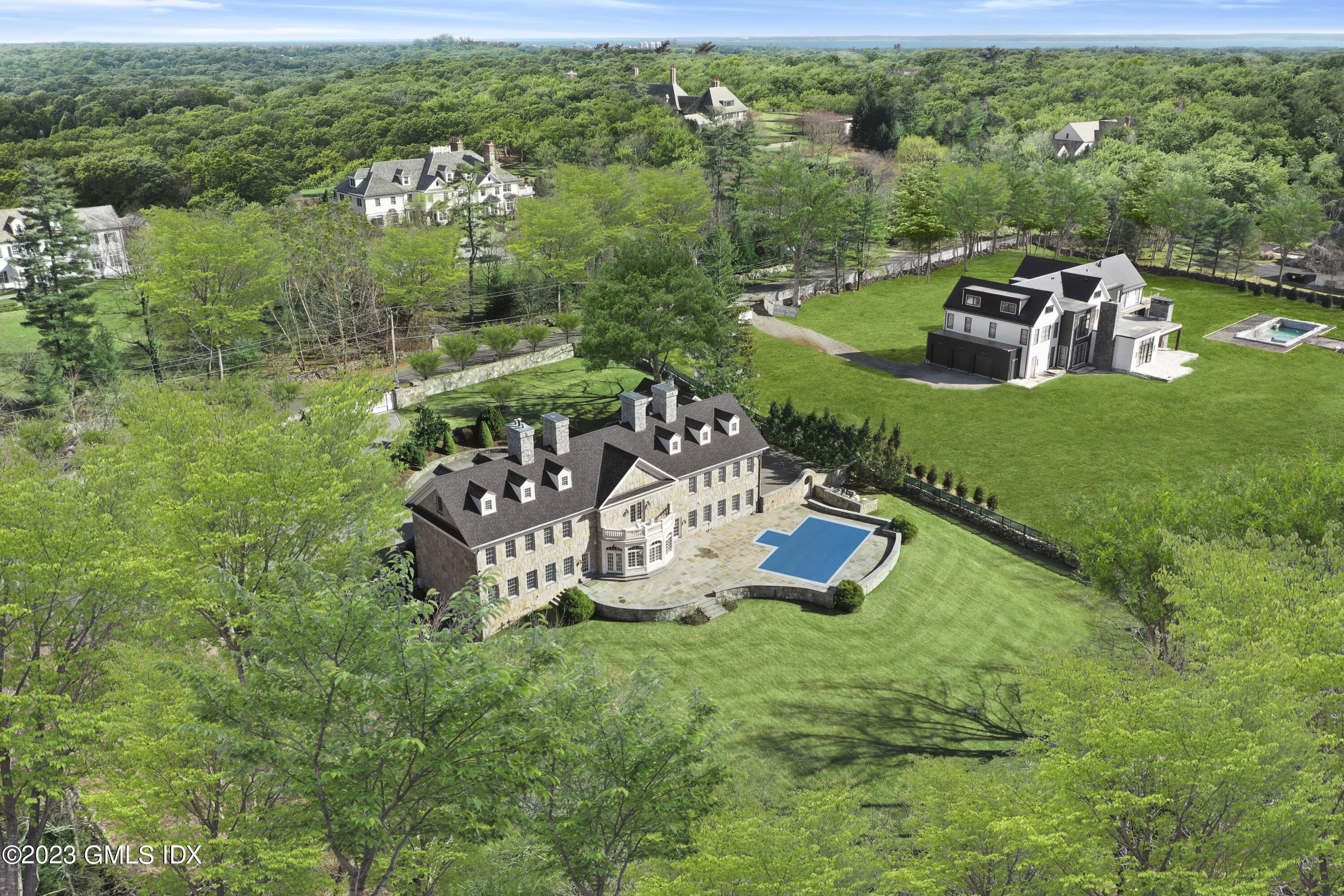 28 Dairy Road Greenwich, CT 06830 - Photo 3 of 44 an aerial view of a house with garden space and street view