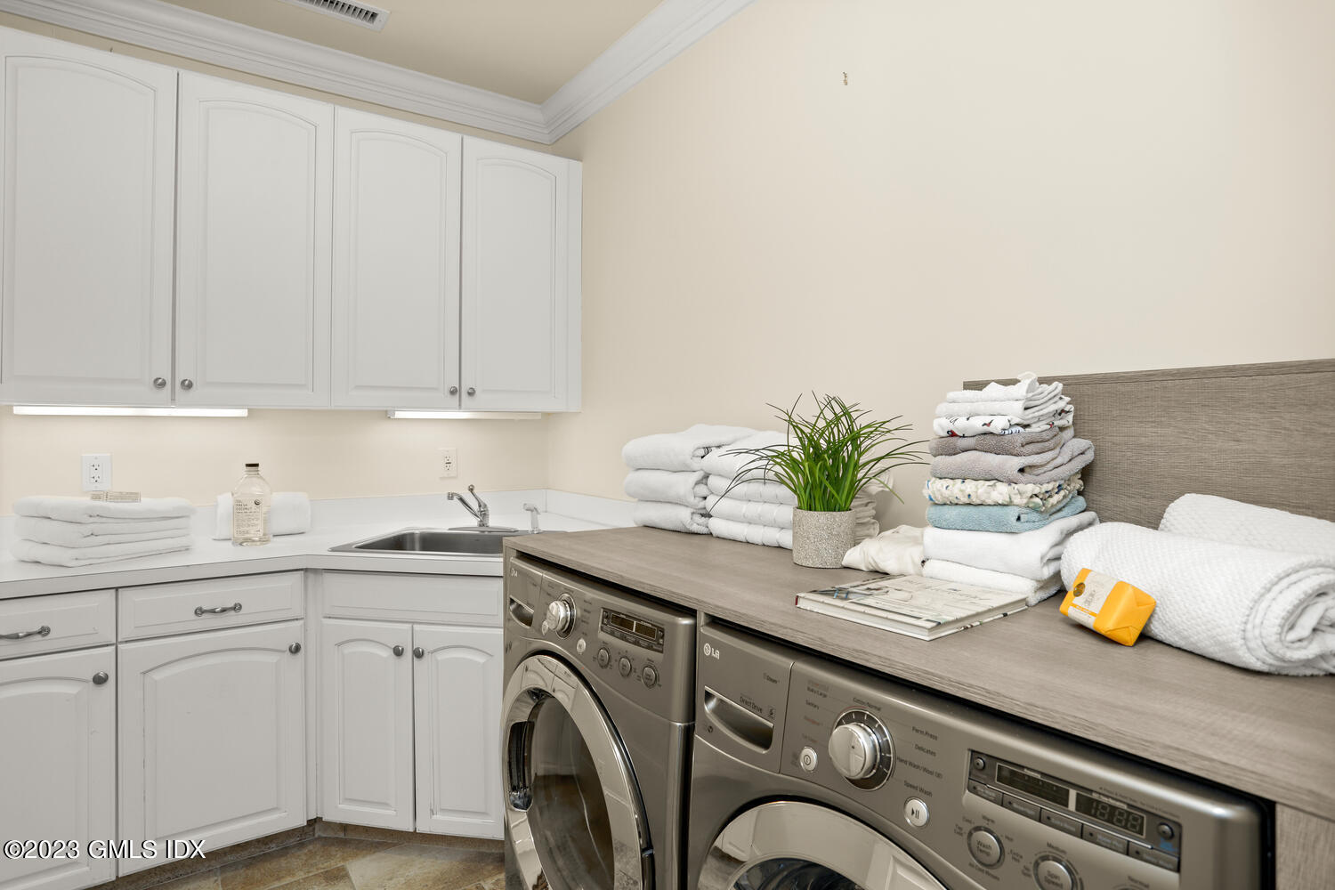 28 Dairy Road Greenwich, CT 06830 - Photo 36 of 44 a view of cabinets a sink and dishwasher in a kitchen