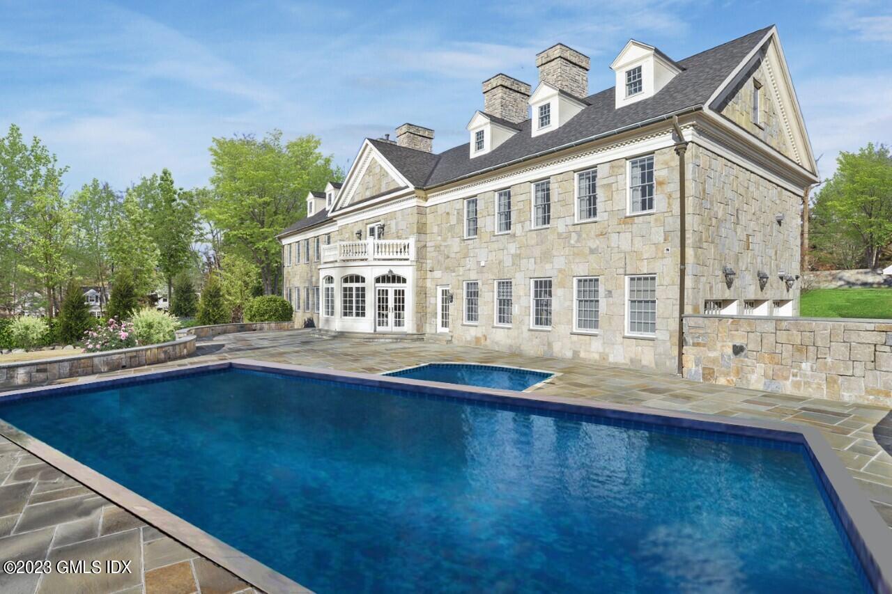 28 Dairy Road Greenwich, CT 06830 - Photo 38 of 44 a view of a house with pool and sitting area
