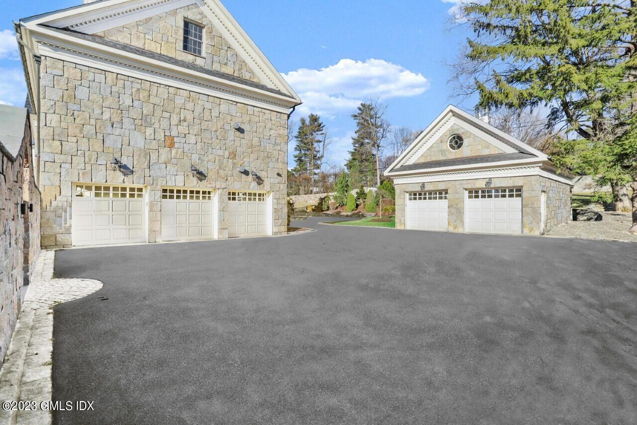 28 Dairy Road Greenwich, CT 06830 - Photo 39 of 44 a view of the house with a street