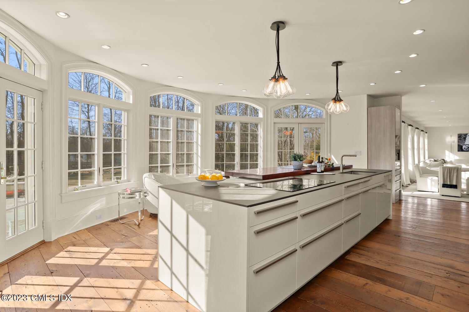 28 Dairy Road Greenwich, CT 06830 - Photo 7 of 44 a large kitchen with stainless steel appliances granite countertop a stove and cabinets