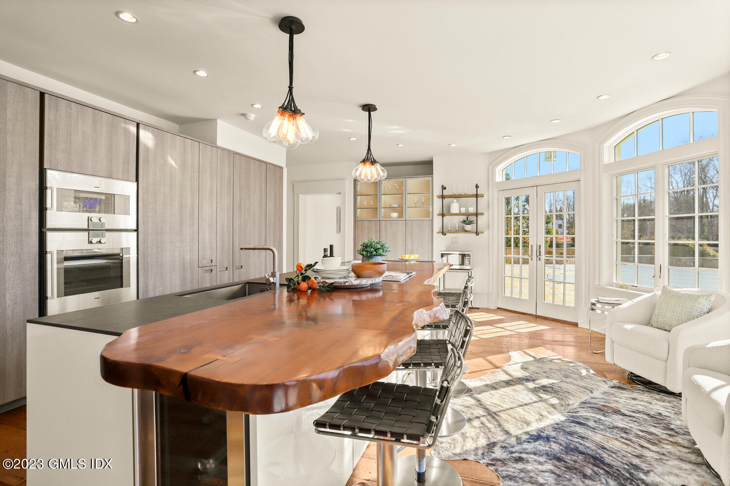 28 Dairy Road Greenwich, CT 06830 - Photo 9 of 44 a dining room with furniture and wooden floor