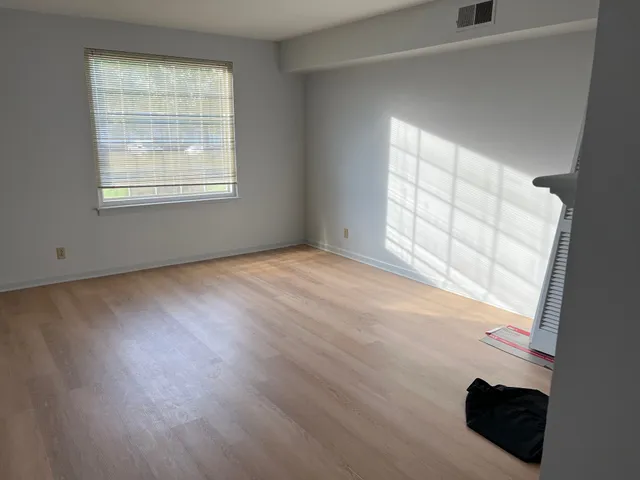 an empty room with windows