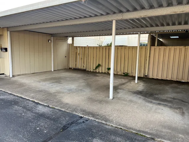 a view of a room with wooden walls