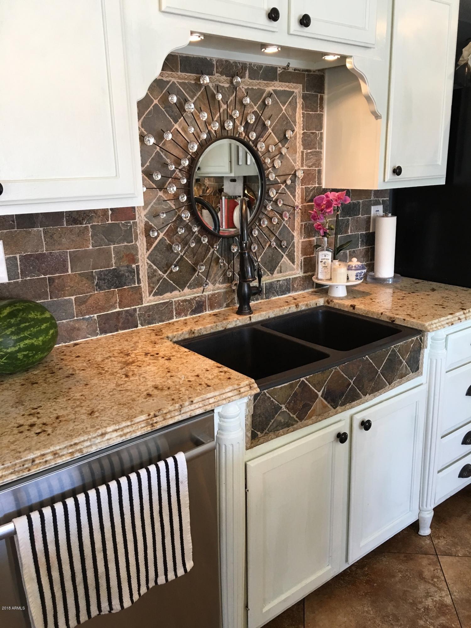 7755 West Calavar Road Peoria, AZ 85381 - Photo 9 of 31 233899C2-01ED-4F44-B3F9-E73728A11BC5