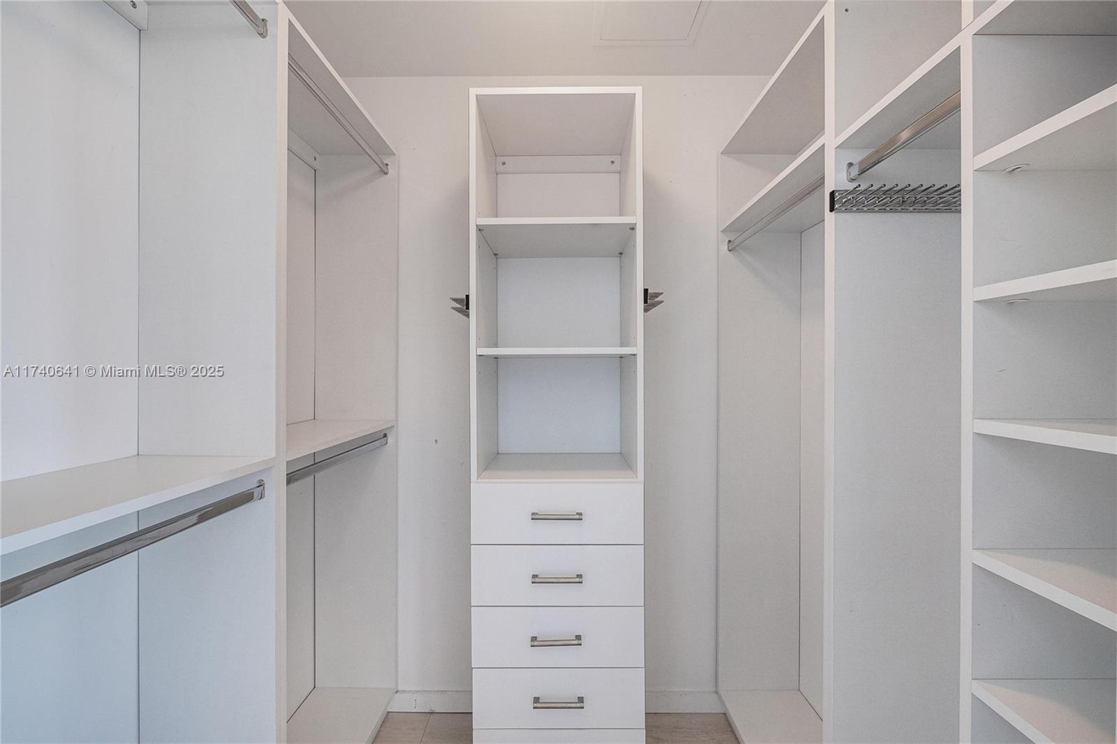 1 Collins Avenue, Unit 304 Miami Beach, FL 33139 - Photo 25 of 40 a view of an empty walk in closet