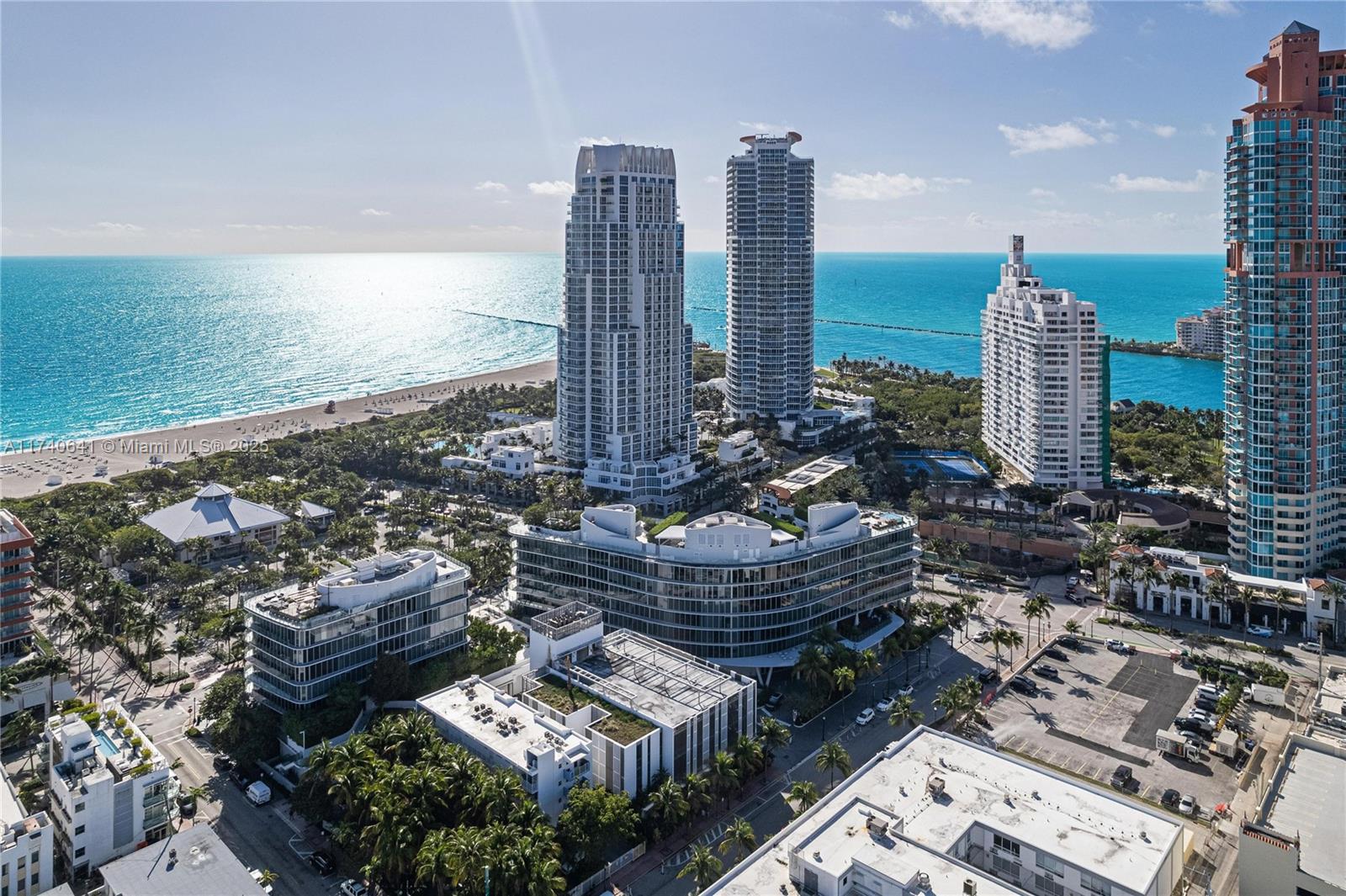 1 Collins Avenue, Unit 304 Miami Beach, FL 33139 - Photo 37 of 40 a city view with tall buildings