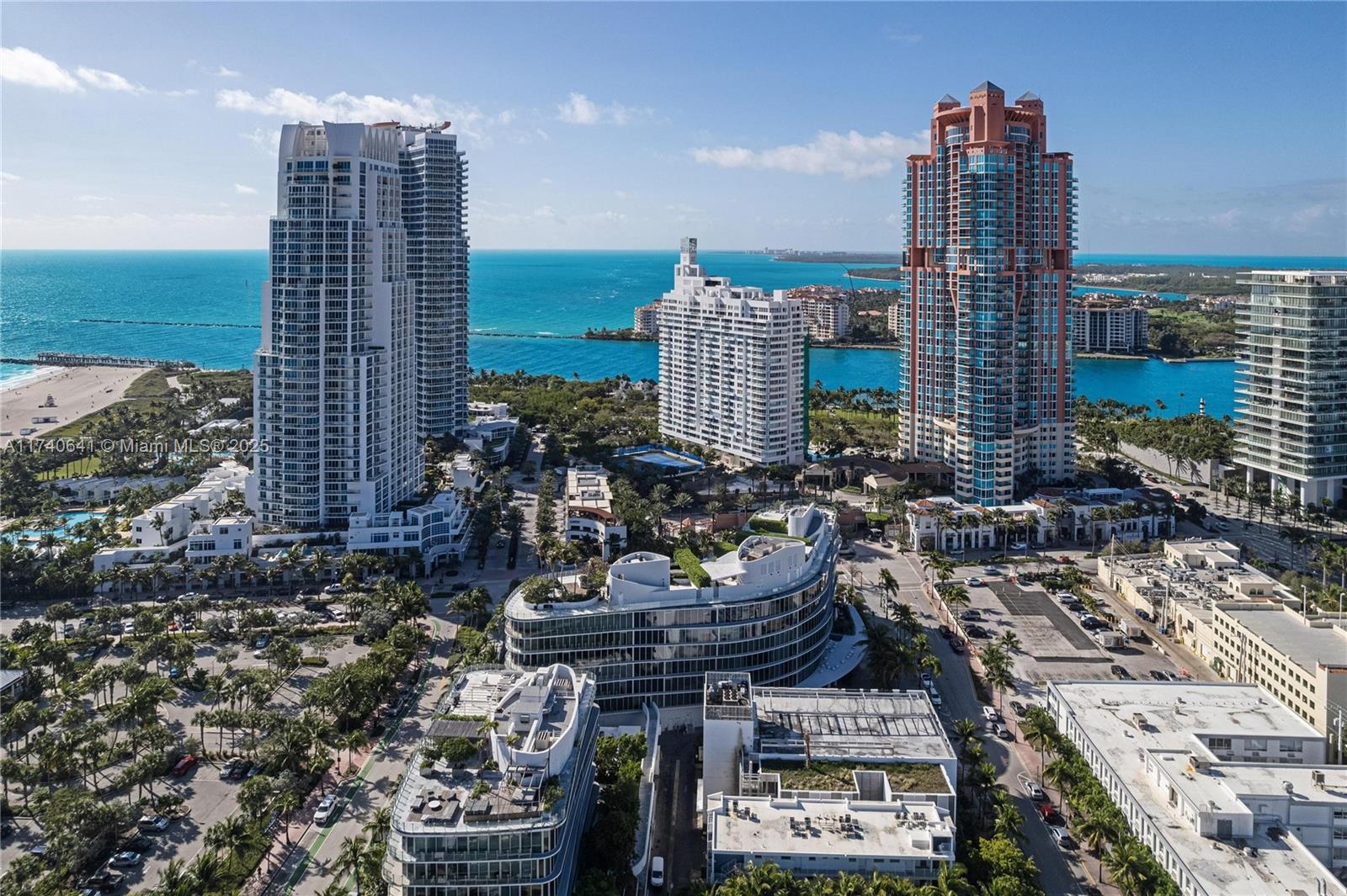 1 Collins Avenue, Unit 304 Miami Beach, FL 33139 - Photo 38 of 40 a city view with tall buildings