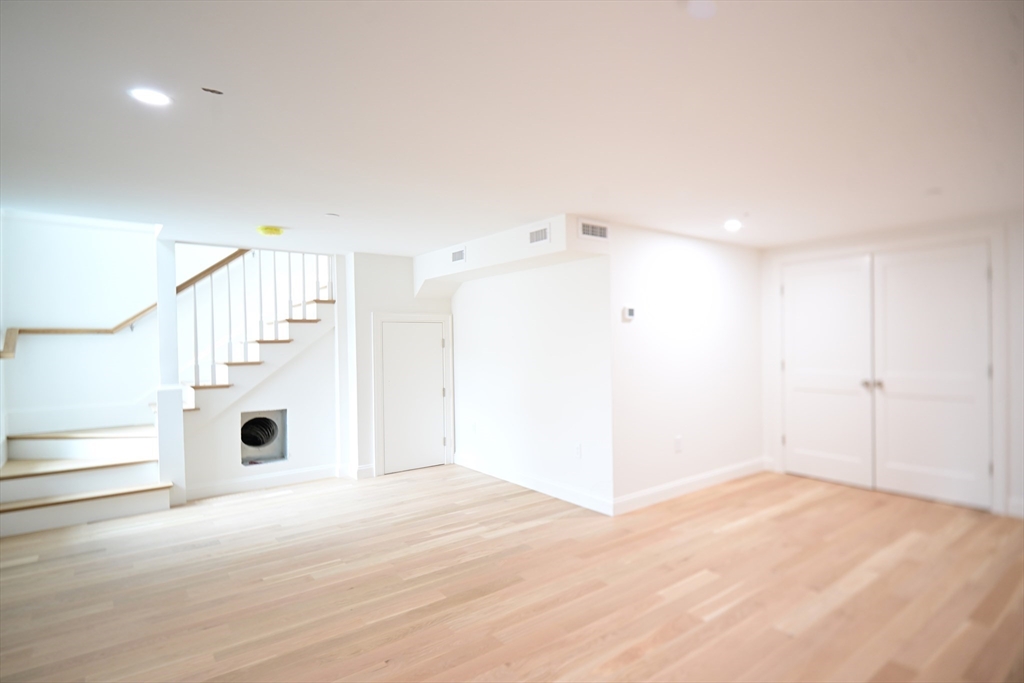 66 Pleasant Street, Unit 1 Marblehead, MA 01945 - Photo 19 of 19 a view of entryway with wooden floor