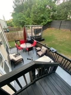 4209 Reeshemah Street Atlanta, GA 30349 - Photo 11 of 12 a view of a balcony with chairs