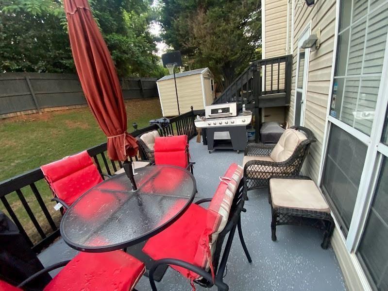 4209 Reeshemah Street Atlanta, GA 30349 - Photo 12 of 12 a building outdoor space with patio furniture