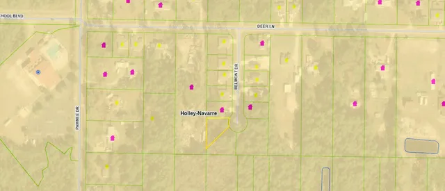 a close up of a white house with a small yard