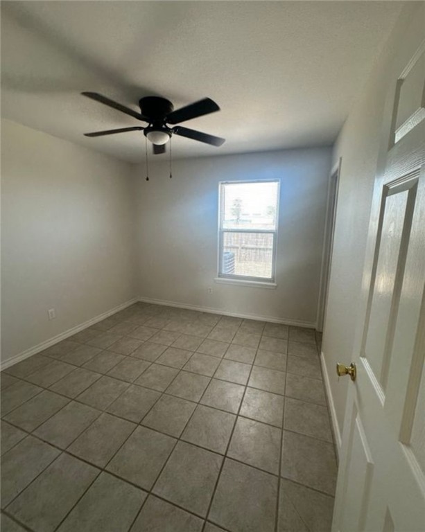 15618 Cruiser Street Corpus Christi, TX 78418 - Photo 7 of 14 a view of an empty room and a window