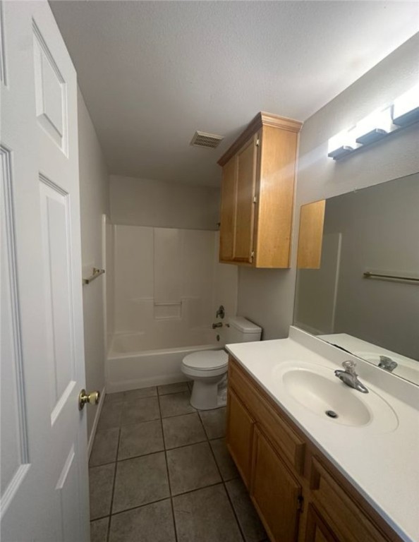 15618 Cruiser Street Corpus Christi, TX 78418 - Photo 10 of 14 a bathroom with a sink toilet and shower