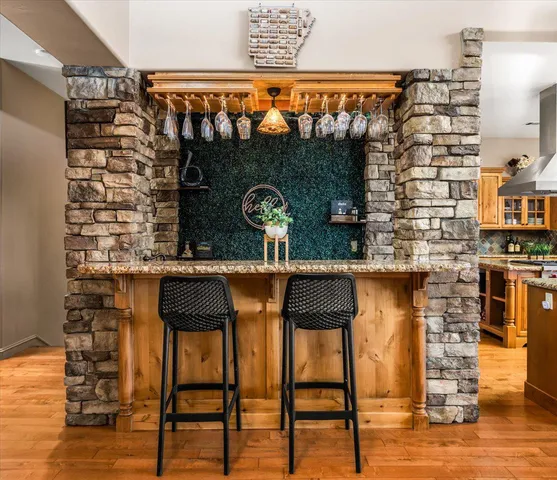 a close view of two chairs in front of building