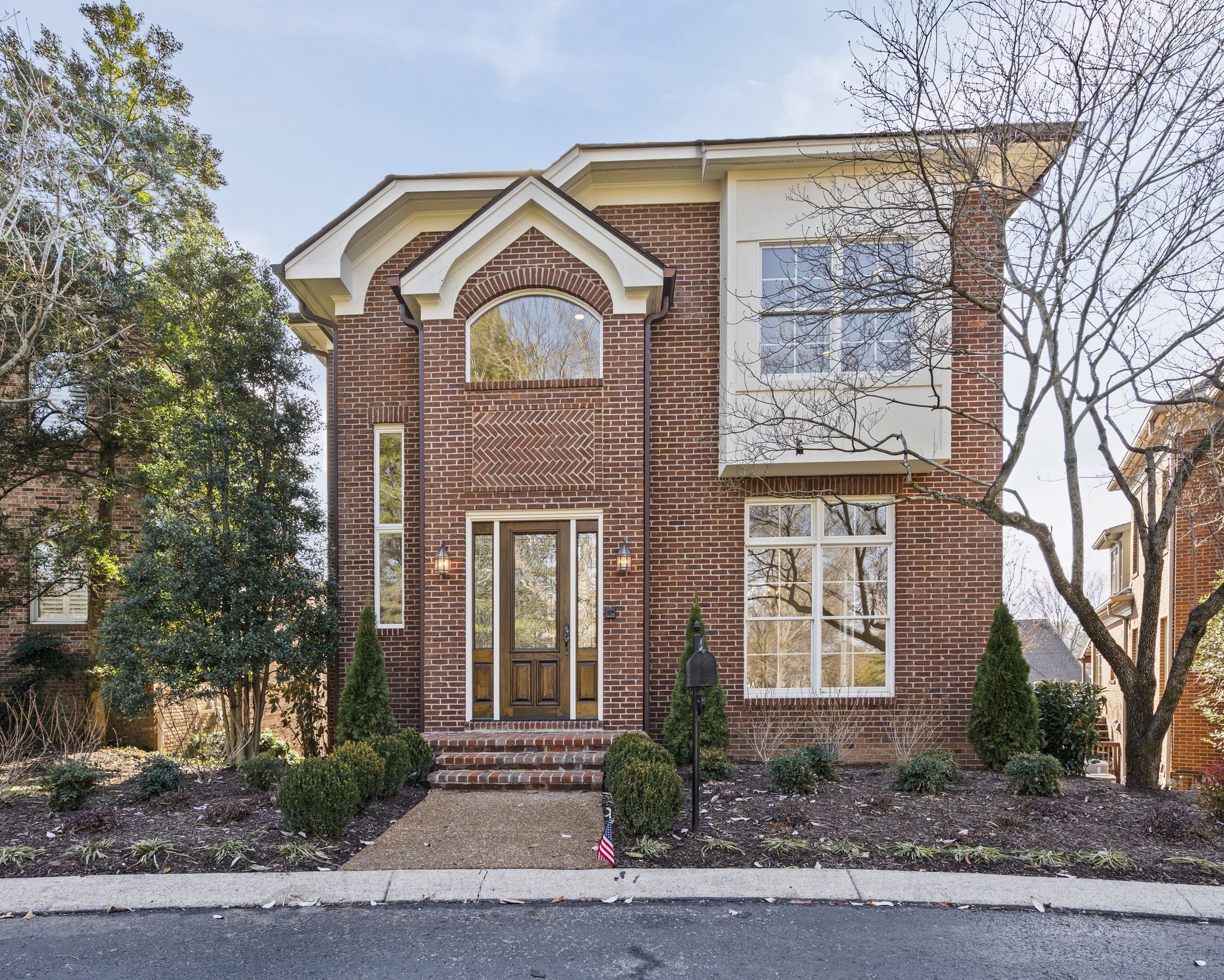 46 Green View Nashville, TN 37205 - Photo 1 of 46 a front view of a house with garden