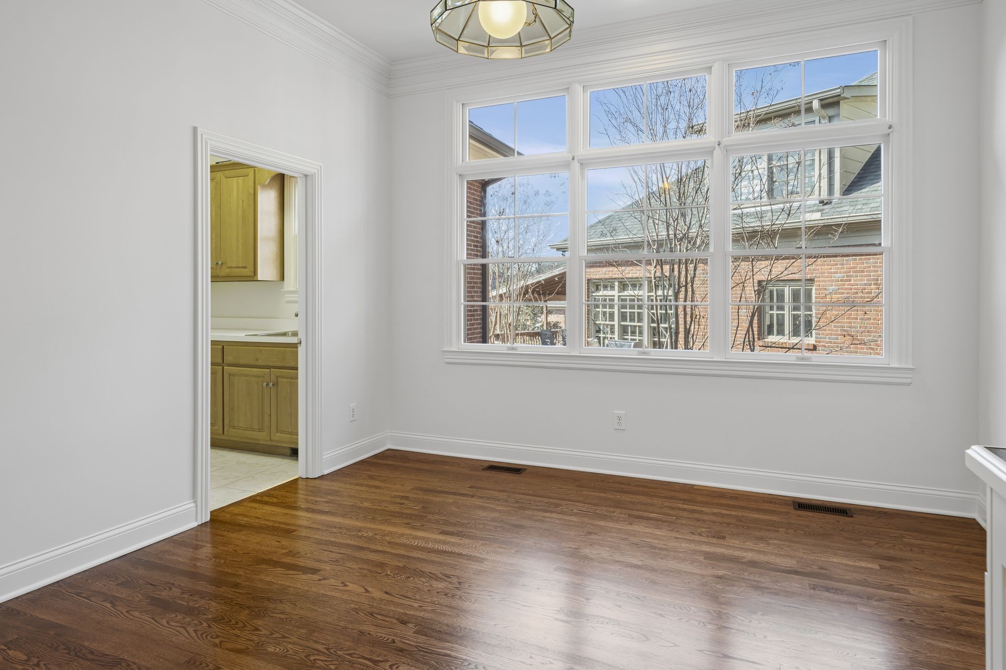 46 Green View Nashville, TN 37205 - Photo 11 of 46 a view of an empty room with wooden floor and a window
