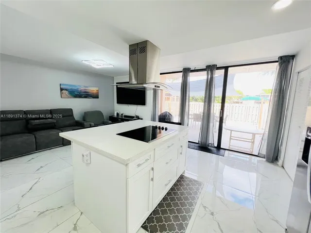 a kitchen with a cabinets and counter space