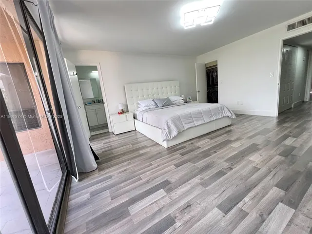 a bathroom with a double vanity sink mirror double and shower