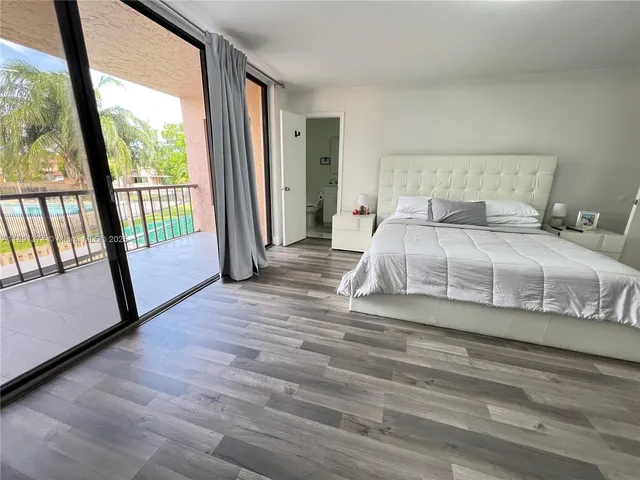 a bathroom with a shower and a shower