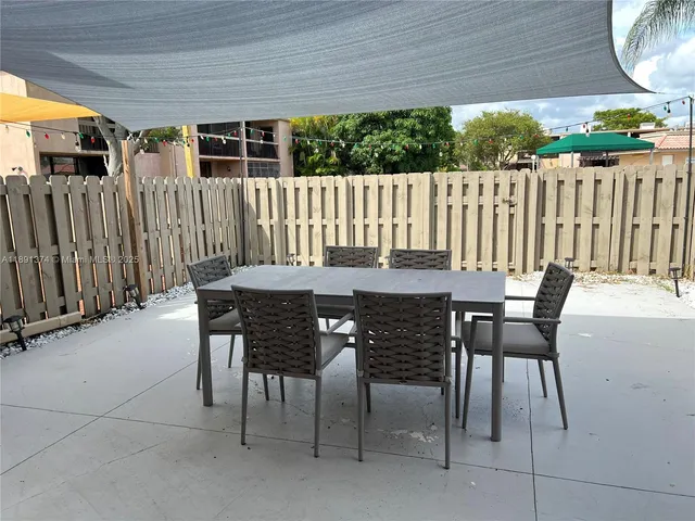 a view of a garage with gym equipment