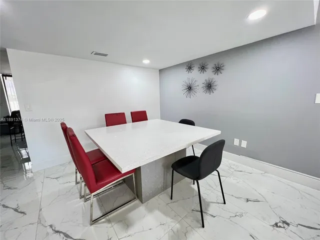 a kitchen with a sink stove and microwave