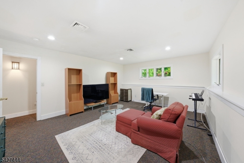 156 Kingsland Road Boonton, NJ 07005 - Photo 21 of 38 a living room with furniture and a flat screen tv