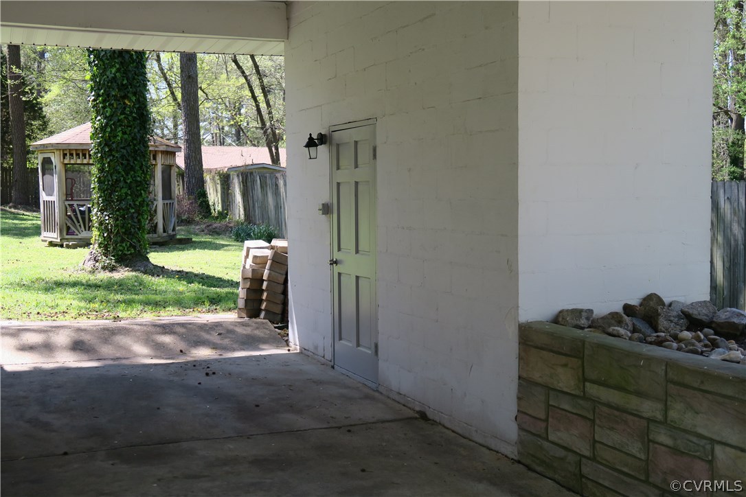 14400 Rivermont Road Chester, VA 23836 - Photo 3 of 15 a backyard of a house with barbeque oven