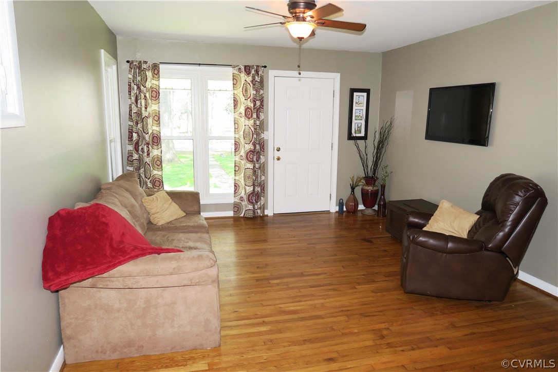 14400 Rivermont Road Chester, VA 23836 - Photo 5 of 15 a living room with furniture and a flat screen tv