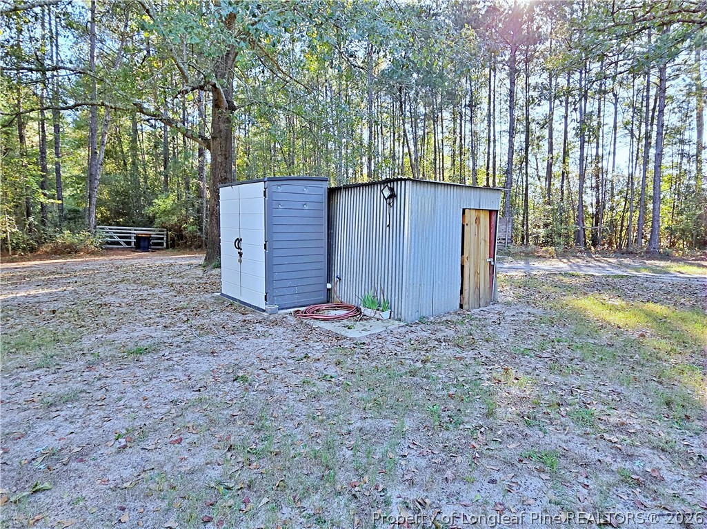1031 Pine Acres Road White Oak, NC 28399 - Photo 24 of 29 a view of a backyard
