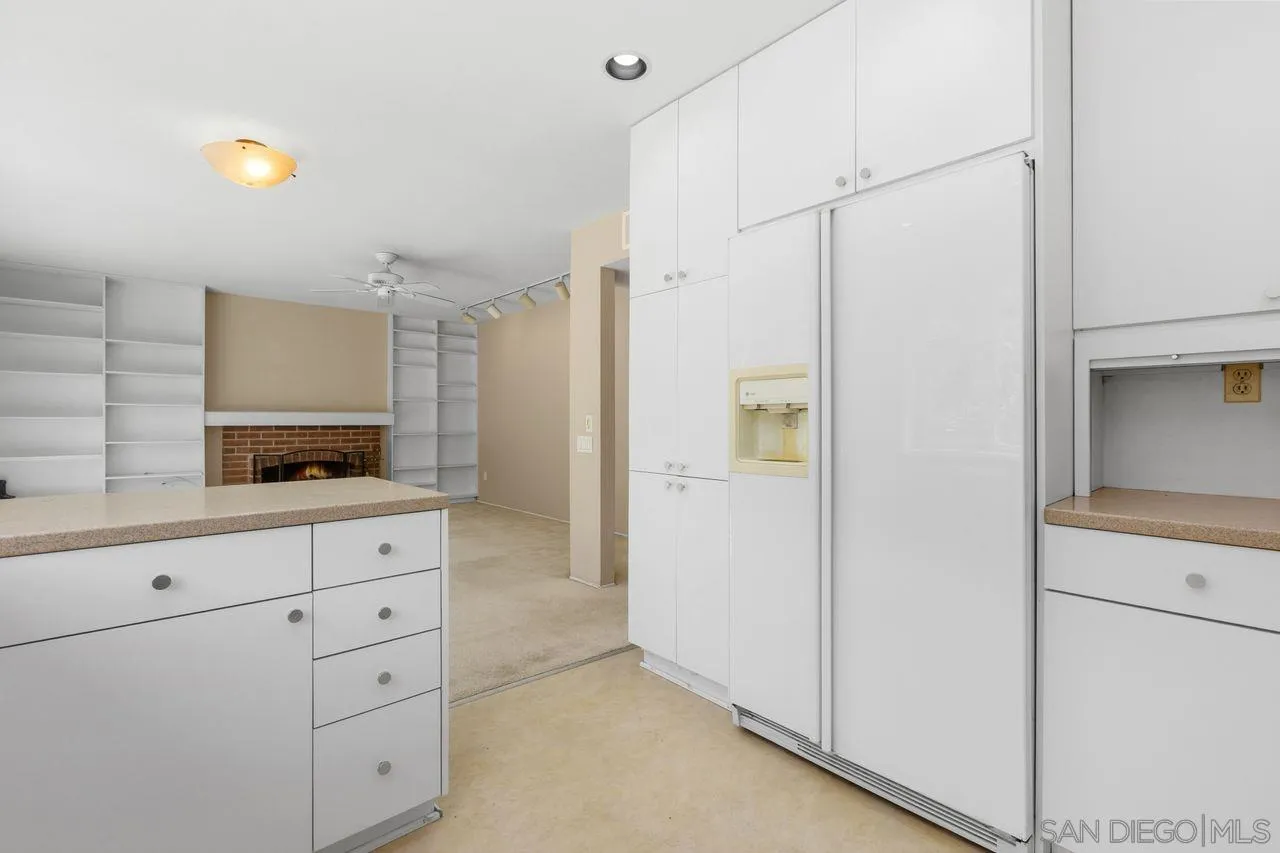 17054 Matinal Road San Diego, CA 92127 - Photo 21 of 50 a view of cabinets and window