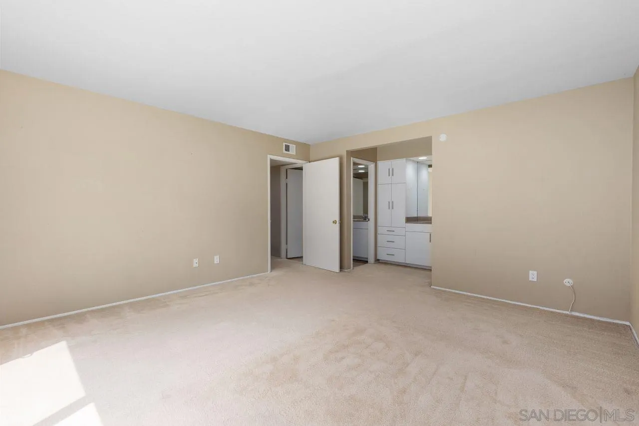 17054 Matinal Road San Diego, CA 92127 - Photo 23 of 50 a view of an empty room and closet area