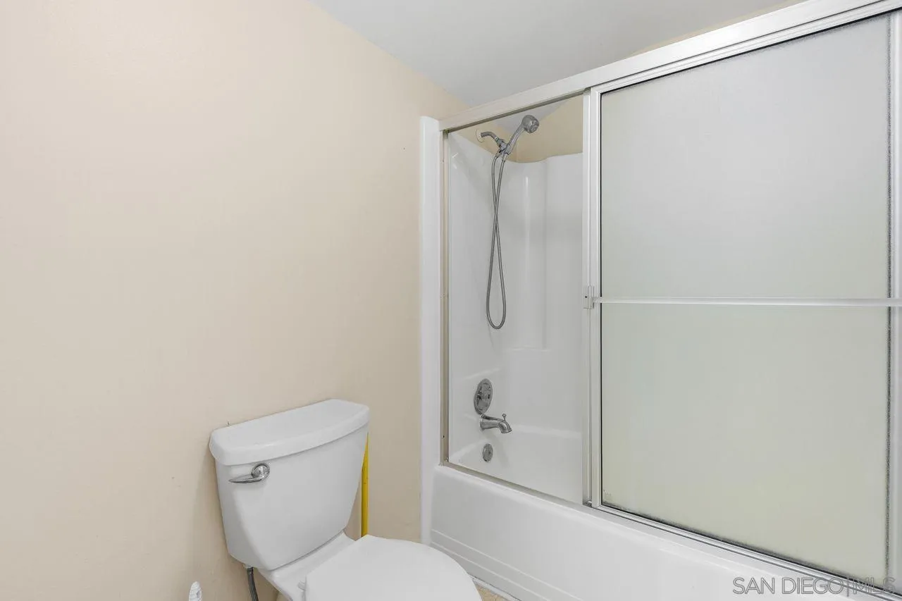 17054 Matinal Road San Diego, CA 92127 - Photo 33 of 50 a white toilet sitting next to a bathroom