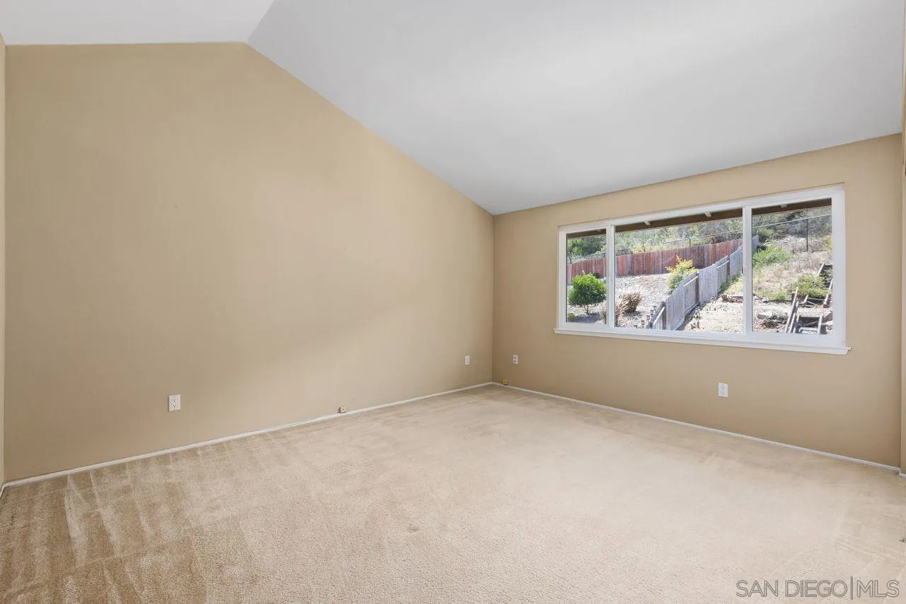 17054 Matinal Road San Diego, CA 92127 - Photo 34 of 50 an empty room with windows