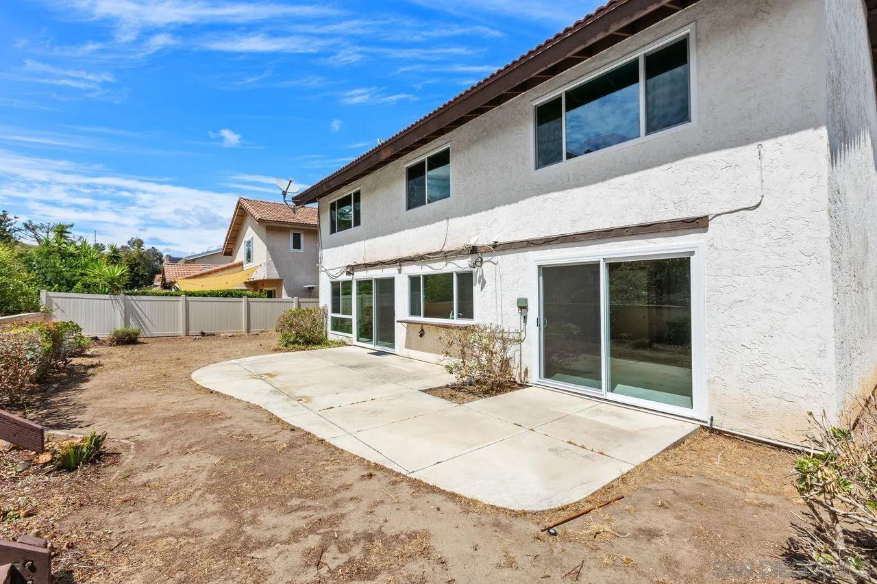 17054 Matinal Road San Diego, CA 92127 - Photo 36 of 50 a front view of a house with a garden