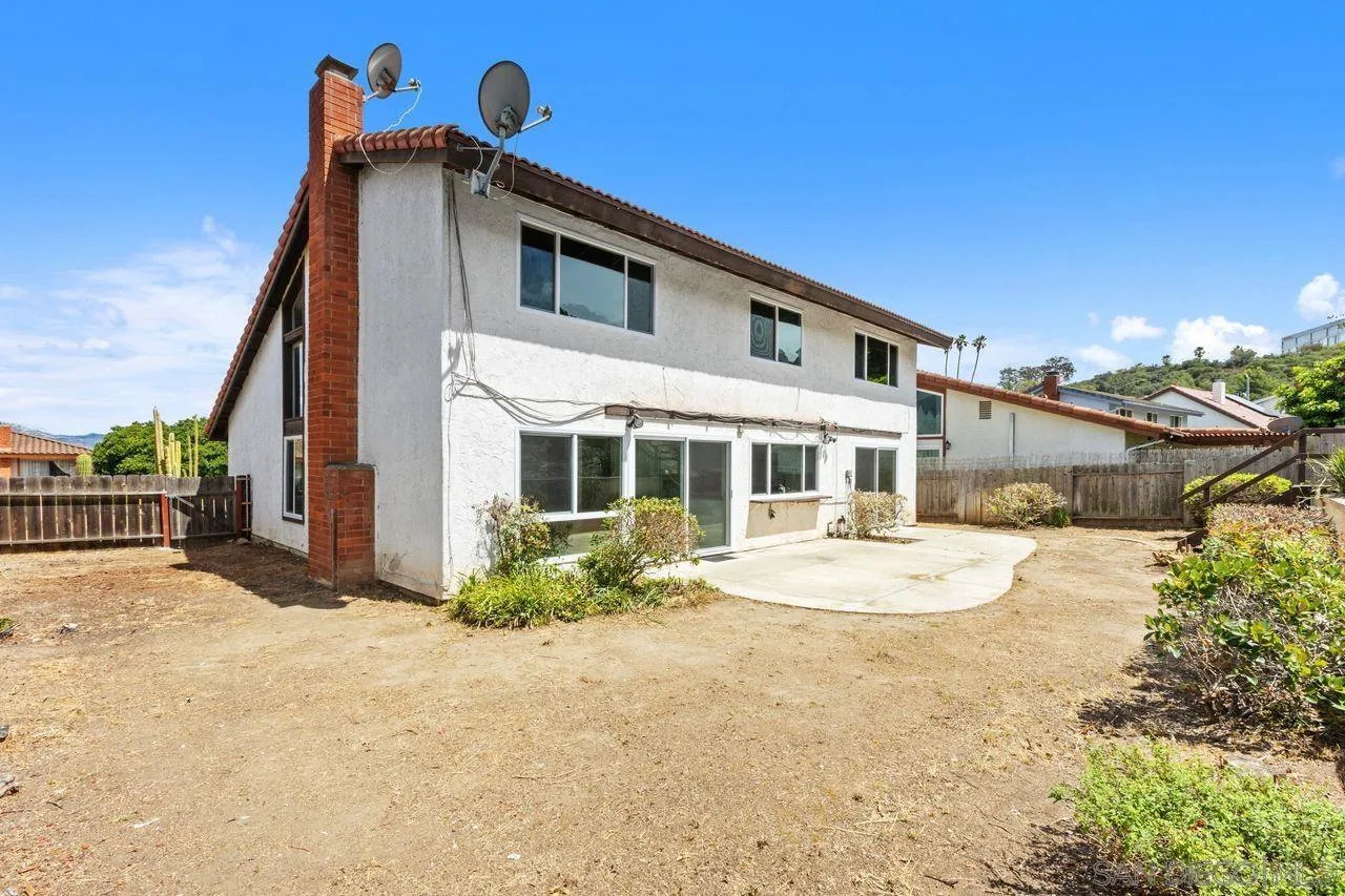 17054 Matinal Road San Diego, CA 92127 - Photo 37 of 50 a front view of a house with a yard