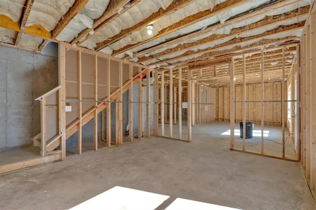 a view of empty room with windows
