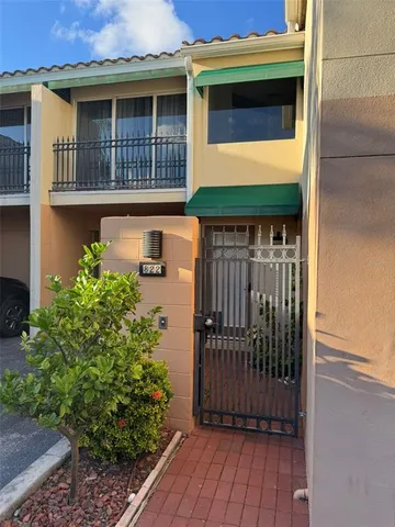 a view of a street with cars