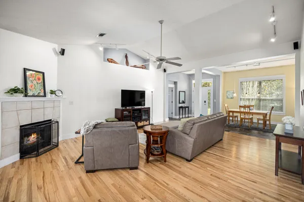 a kitchen with stainless steel appliances a microwave a sink and a refrigerator