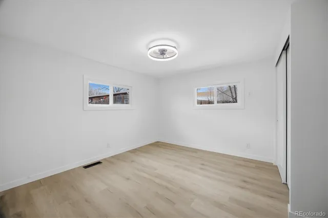 an empty room with a door