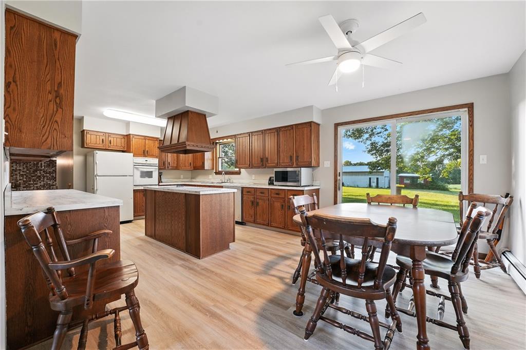 257 Halltown Road Wampum, PA 16157 - Photo 3 of 9 a view of a dining room with furniture window and outside view