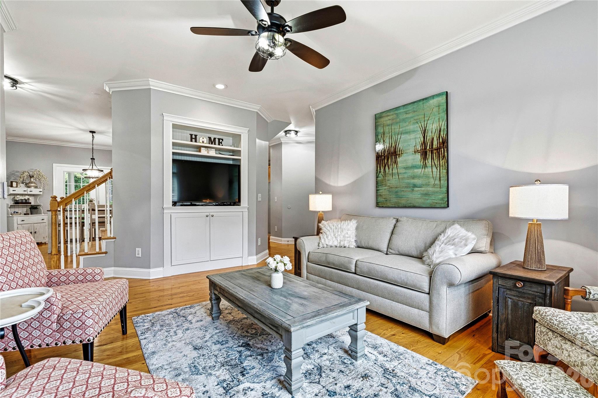 1606 High Ridge Drive Stanley, NC 28164 - Photo 17 of 44 a living room with furniture and a flat screen tv