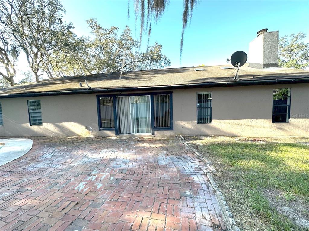 5061 Barnegat Point Road Orlando, FL 32808 - Photo 31 of 33 a house view with a outdoor space