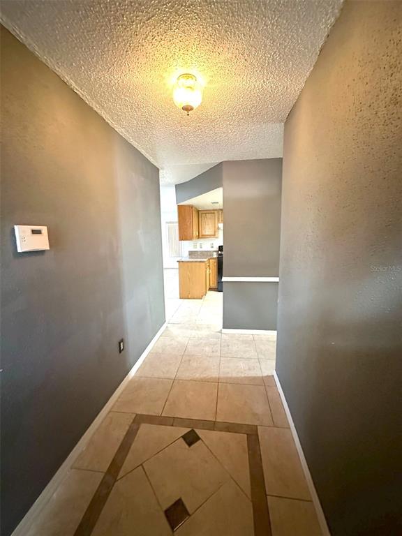 5061 Barnegat Point Road Orlando, FL 32808 - Photo 4 of 33 a view of hallway