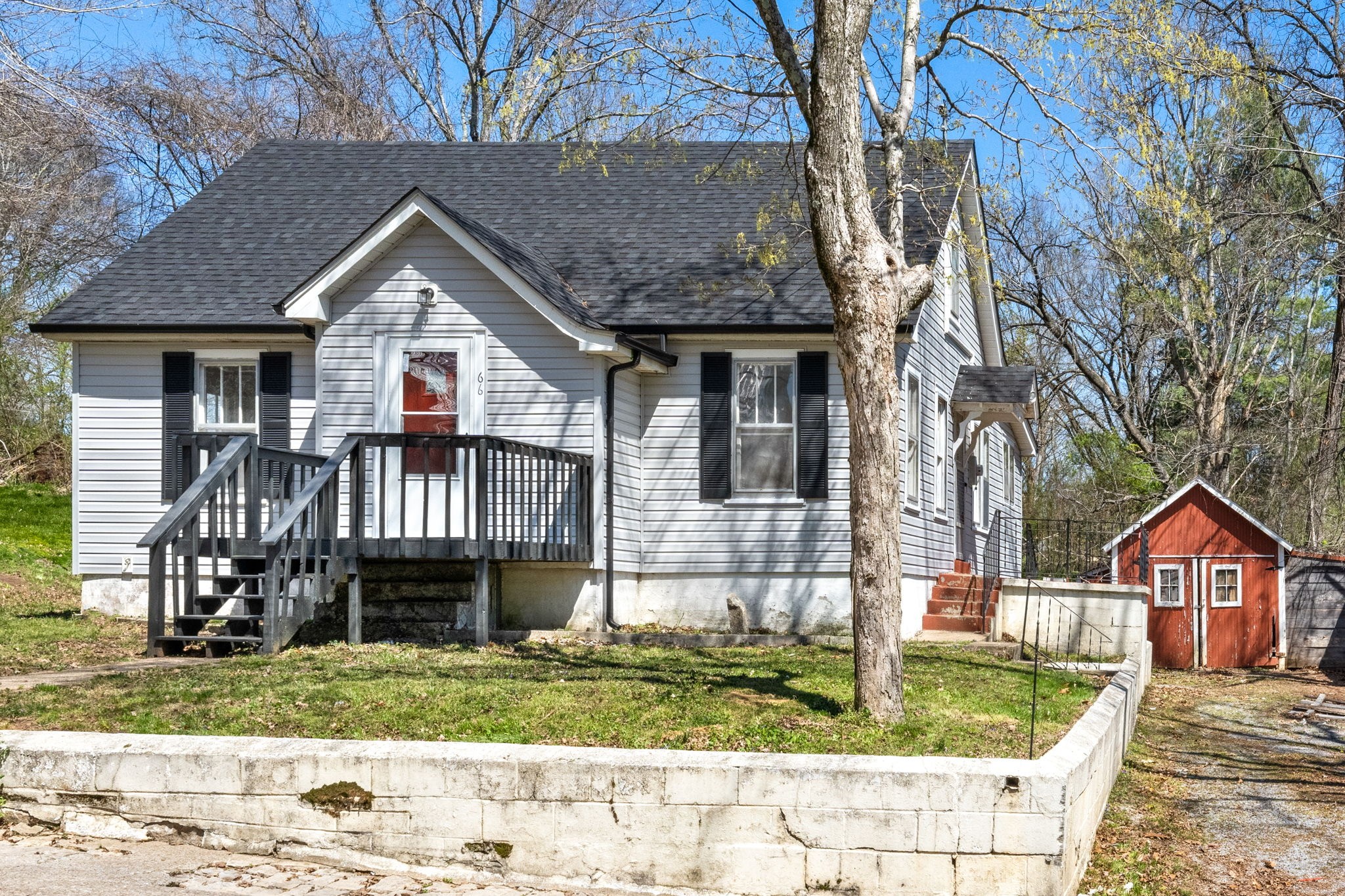 66 Monroe Street Cadiz, KY 42211 - Photo 1 of 15 front view of a house with a yard