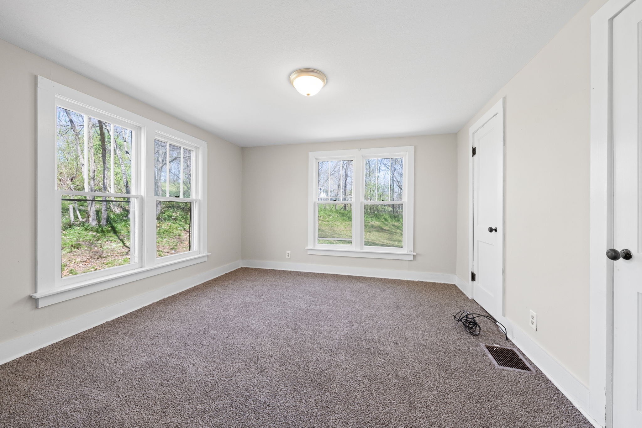 66 Monroe Street Cadiz, KY 42211 - Photo 12 of 15 an empty room with windows and closet